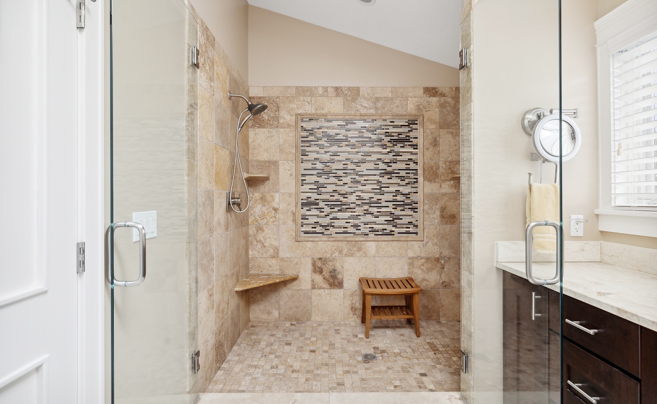 There’s plenty of room for everyone in this bathroom with sleek features and ample counter space.