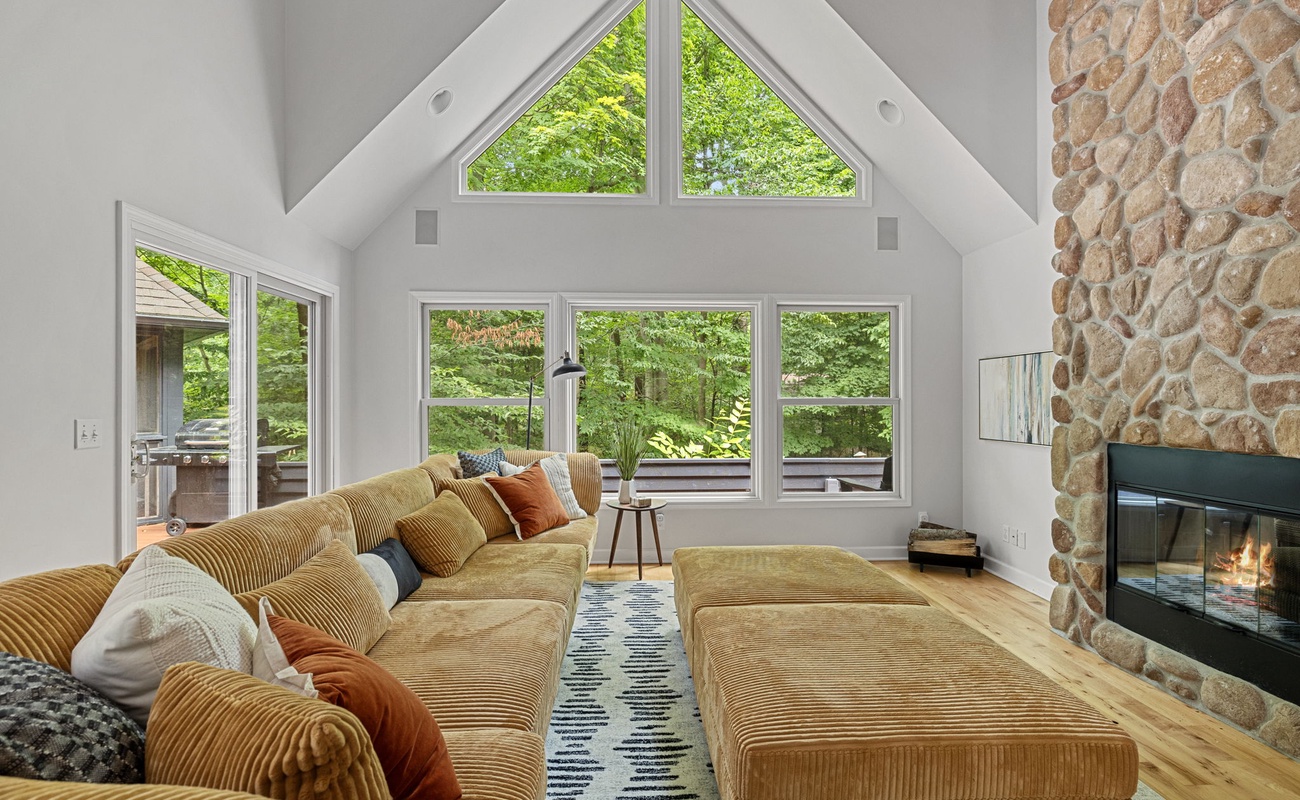 Cozy up by the fire and let the forest views take your breath away.