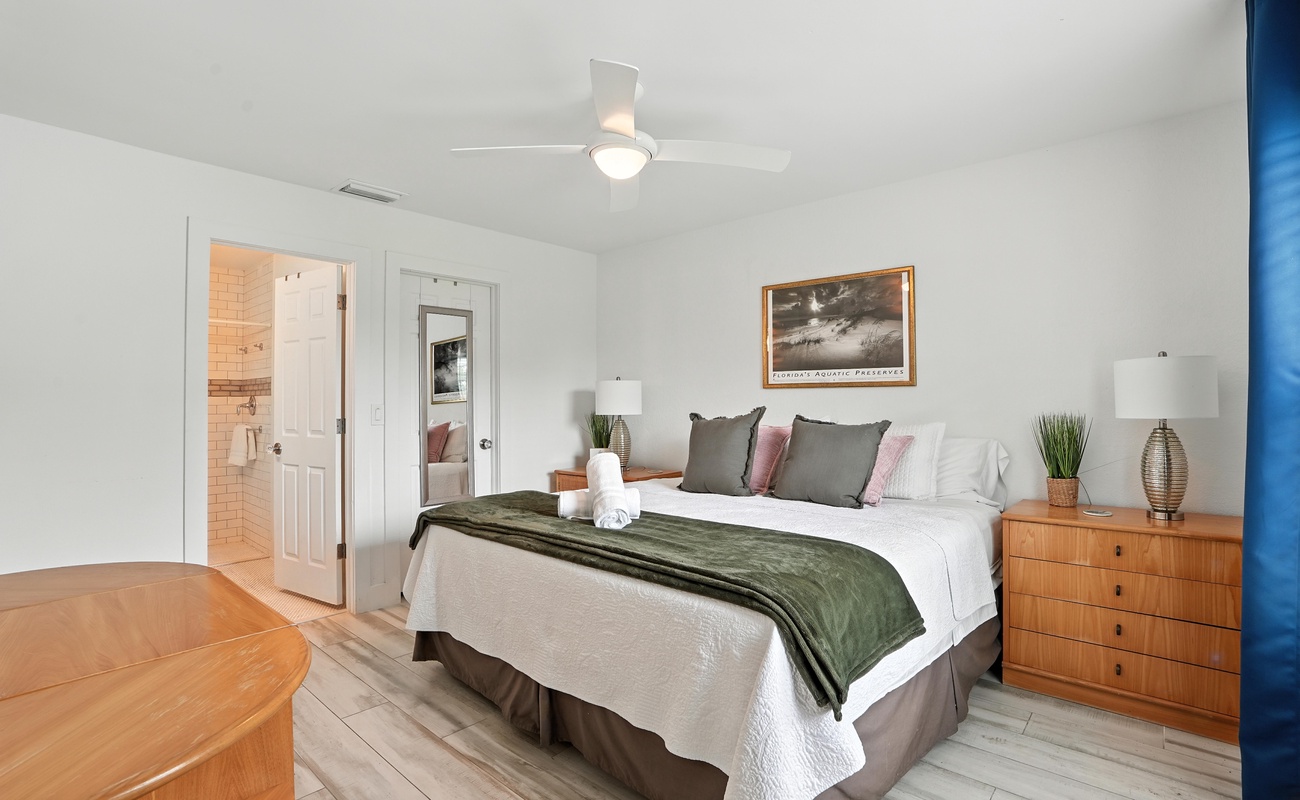 Primary bedroom has a king-size bed.