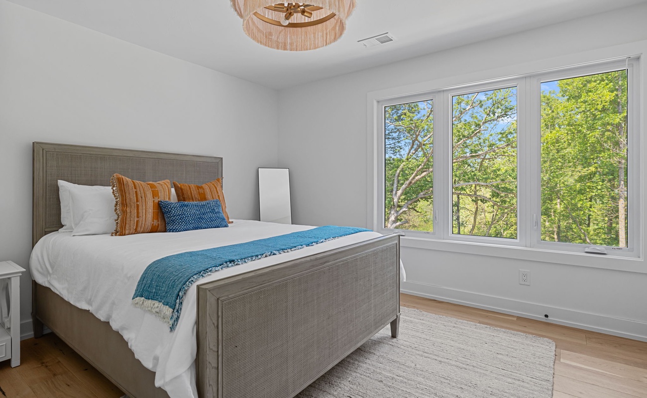 Bedroom 3 is on the main level & has a queen-size bed.