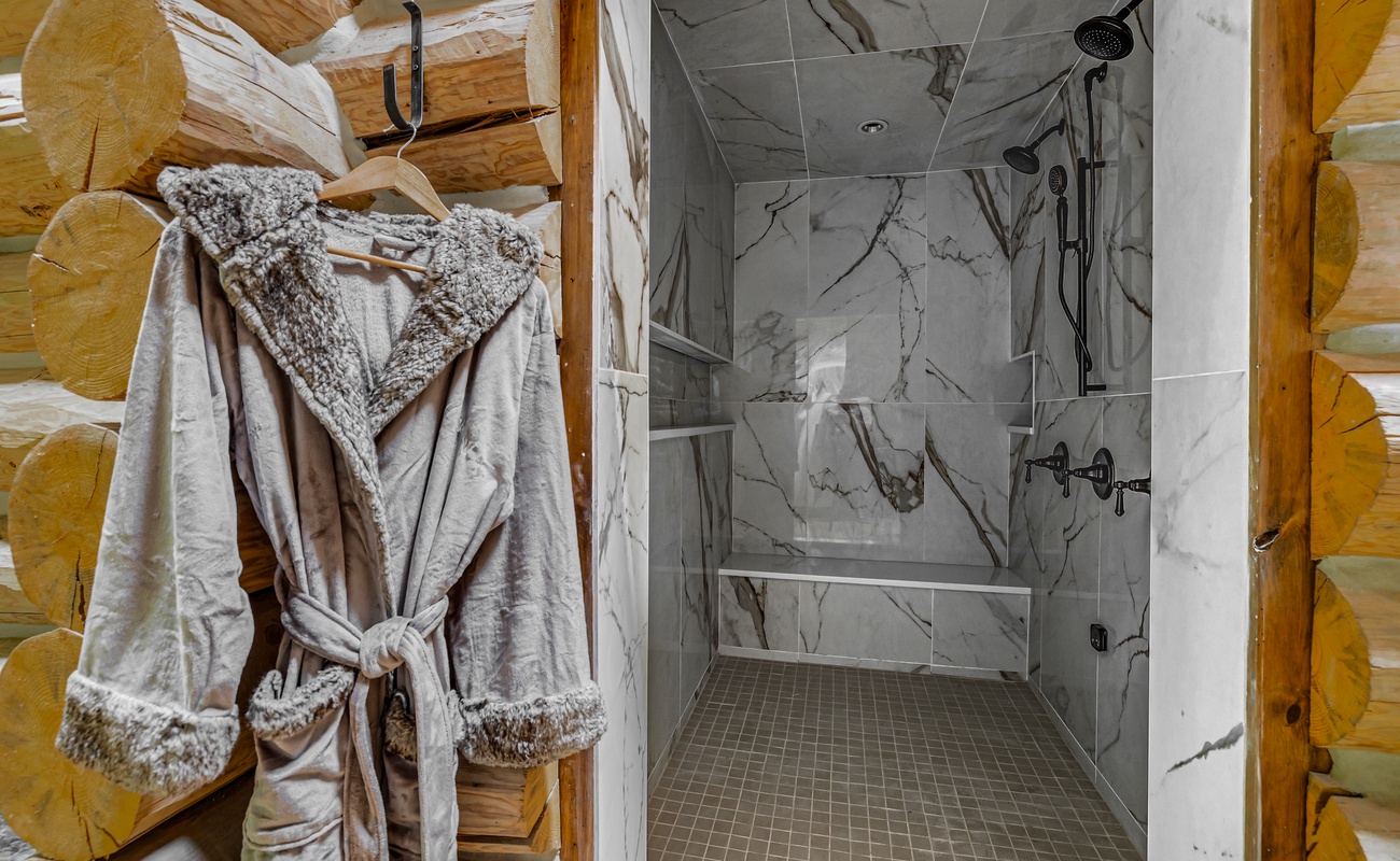 Wrap yourself in softness after a soothing, marble-tiled rinse.