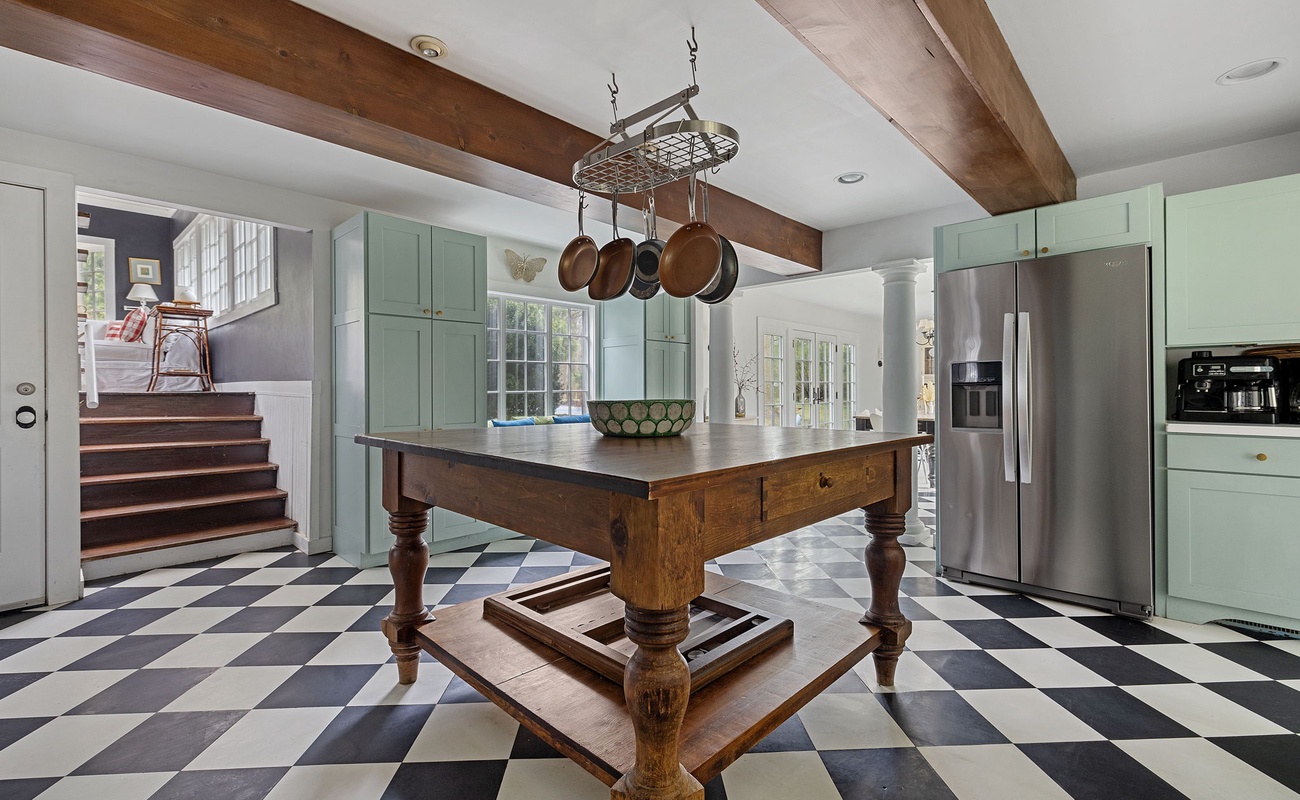 This magnificent island table makes for a great coffee spot in the morning.
