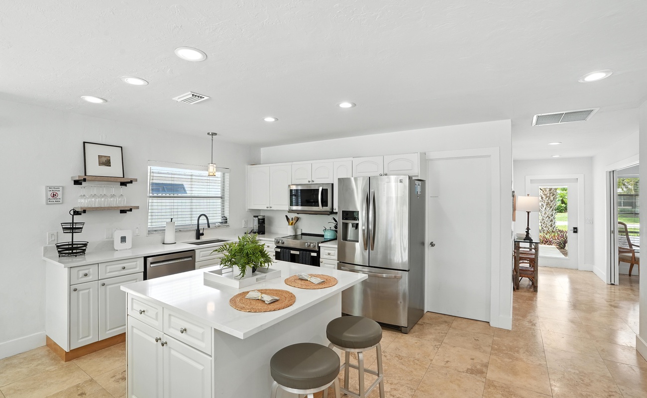 Sleek surfaces and sunlit style for your gourmet moments.