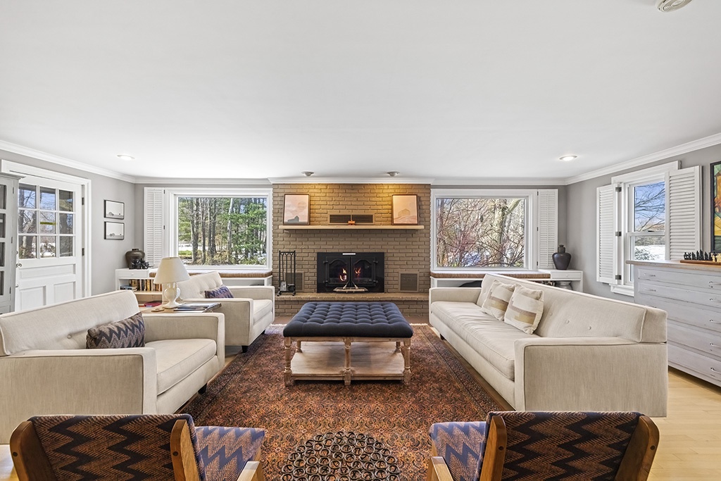 The Farmhouse's spacious living room is perfect for games, stories, and fireside nights.