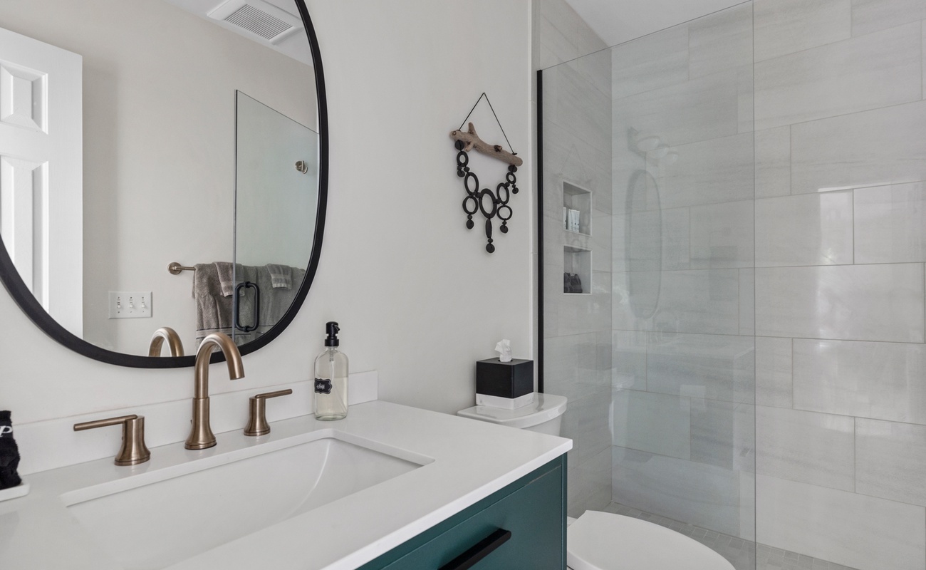Each bathroom is styled with marble counters & high-end fixtures.