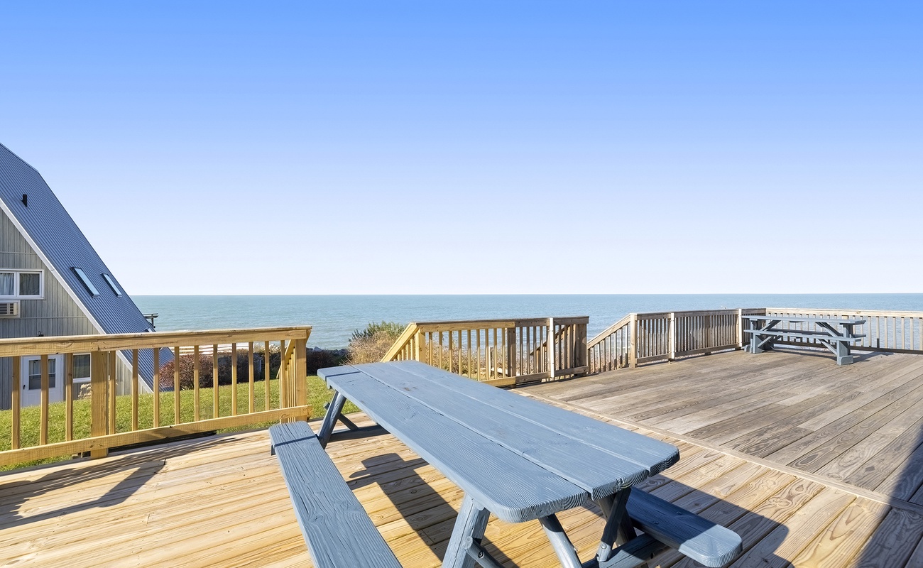 Enjoy lakeside picnics and golden hour gatherings right on our open-air deck.