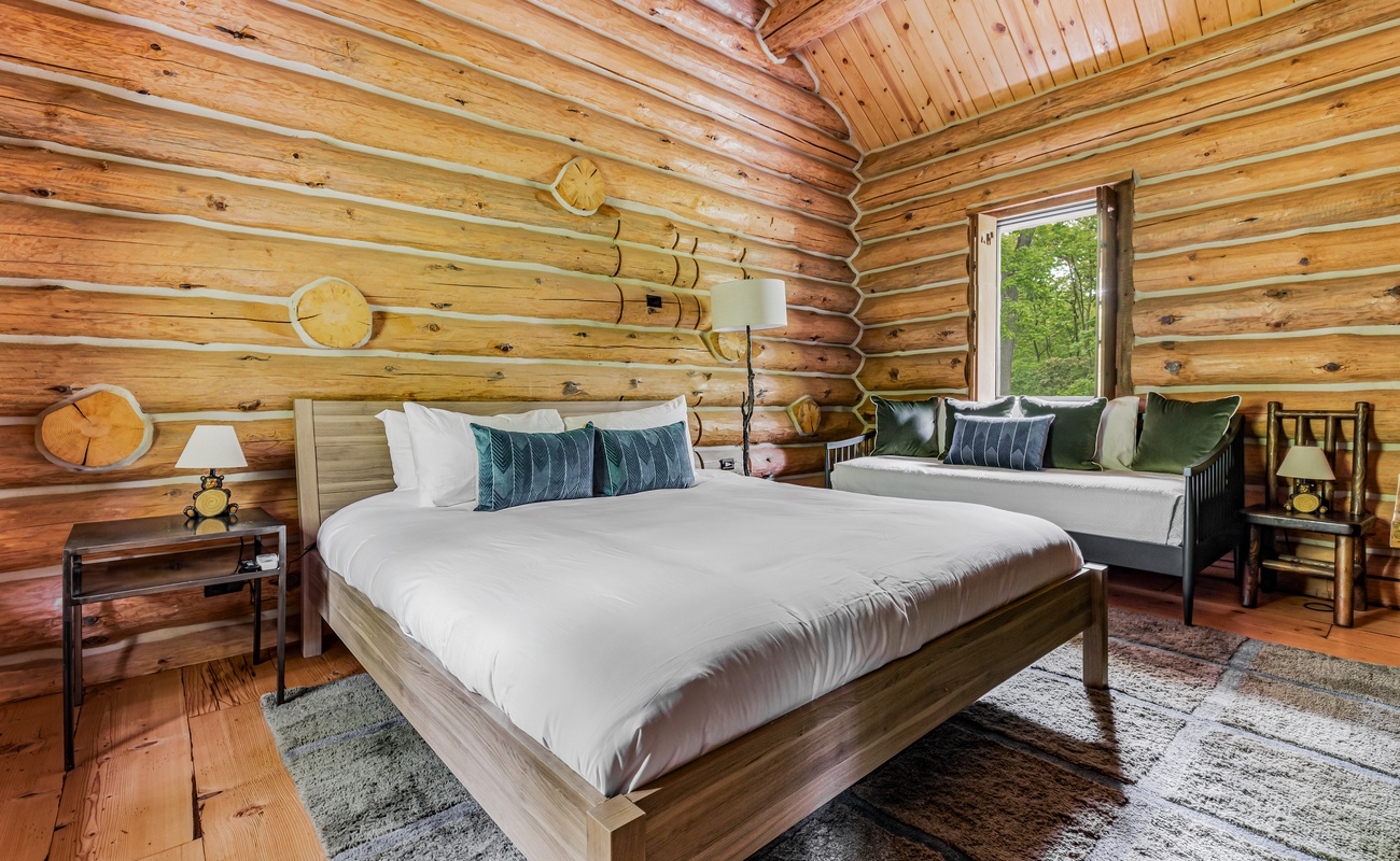 Bedroom 2 is on the upper level & has a king-sized bed and a daybed.