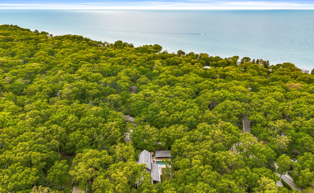 Nestled in lush greenery, just a 10-minute walk to the beach.