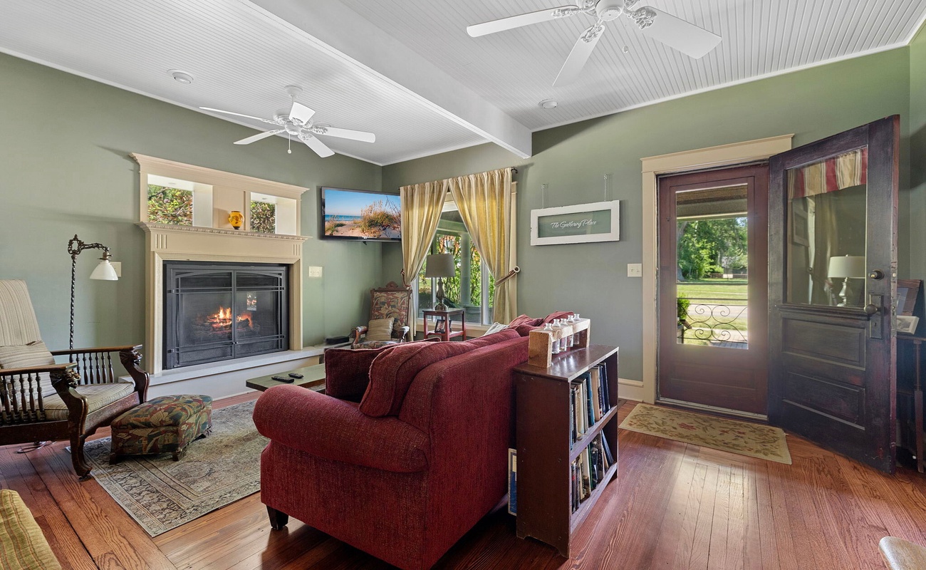 Cozy living room vibes with a warm fireplace and vintage charm.