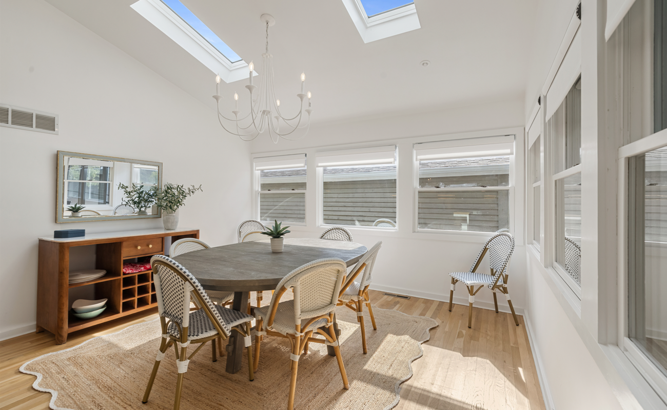 Gather, laugh, and linger longer in this sun-kissed dining room. Where refined charm meets natural light and every meal feels like a celebration!