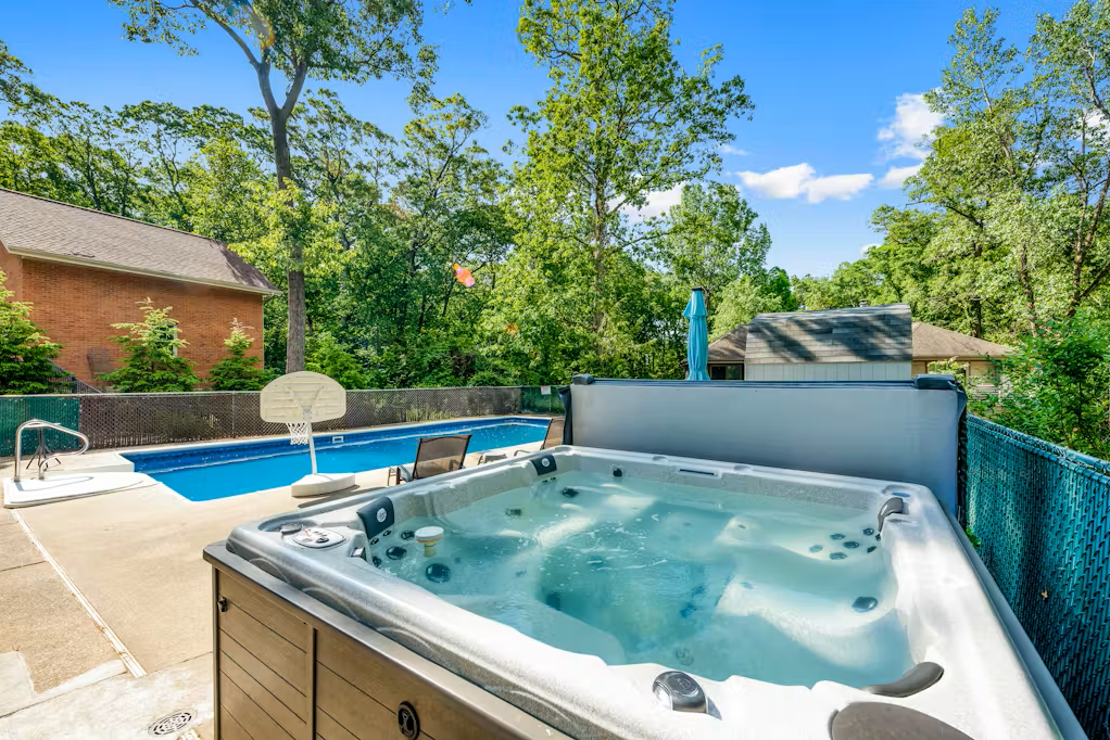 Unwind in the hot tub after a refreshing pool swim.