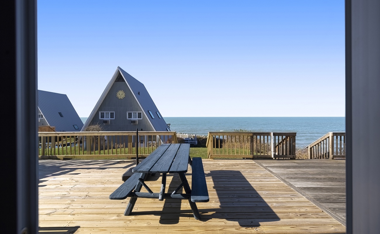 Dine al fresco and enjoy endless lake horizons from Leila's deck.