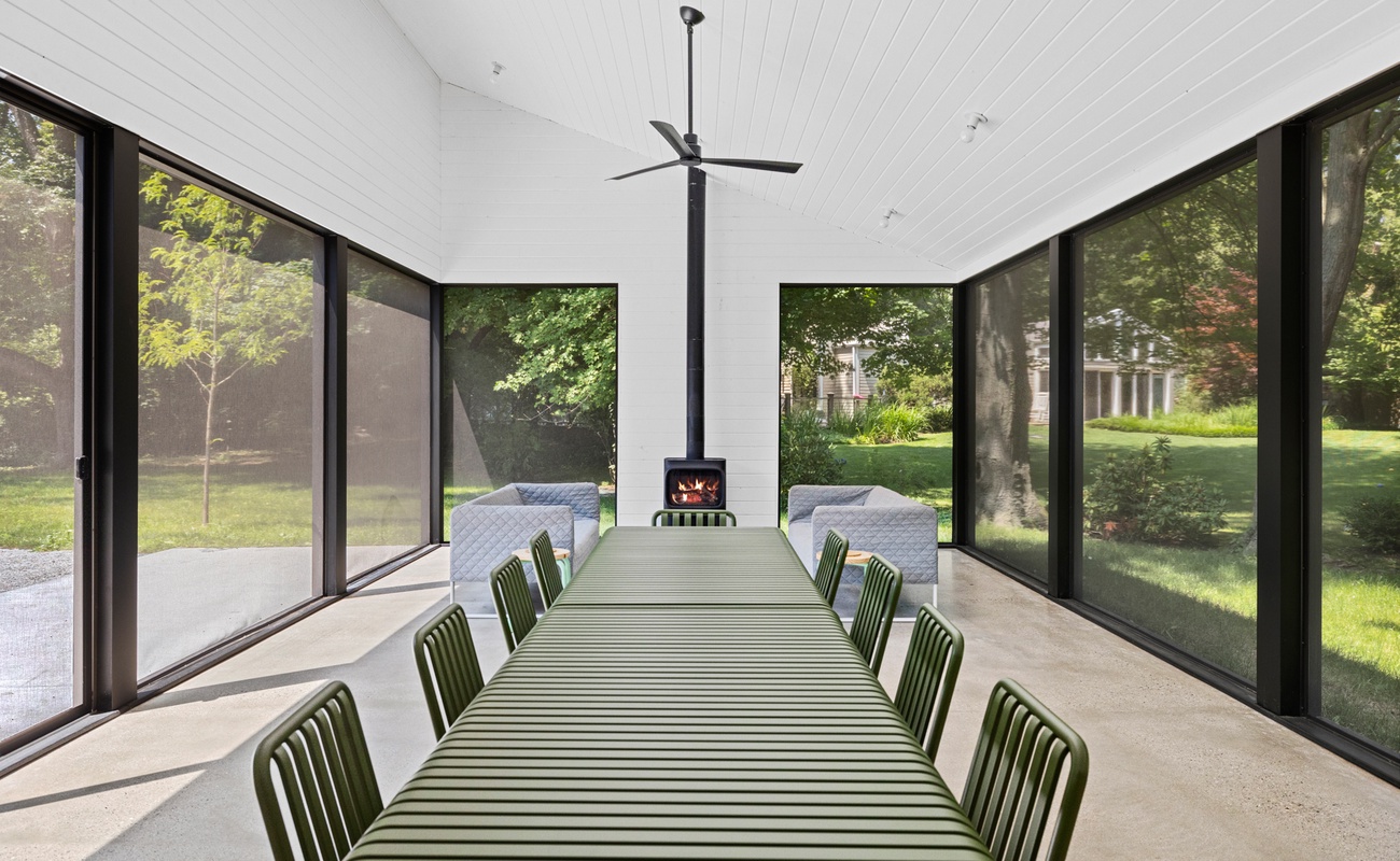 The porch is ready to host memorable gatherings and delightful conversations.