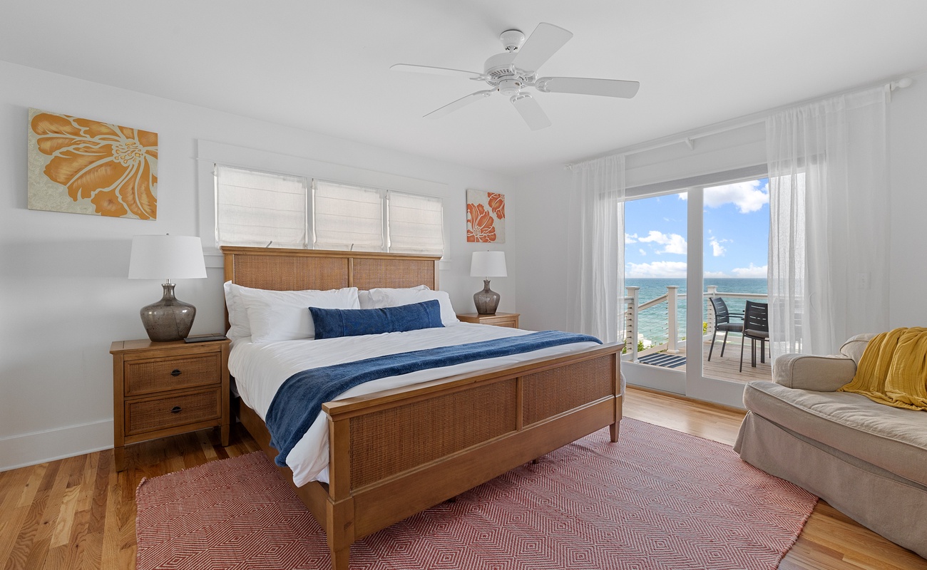 Primary bedroom is on the main level & has a king-size bed.