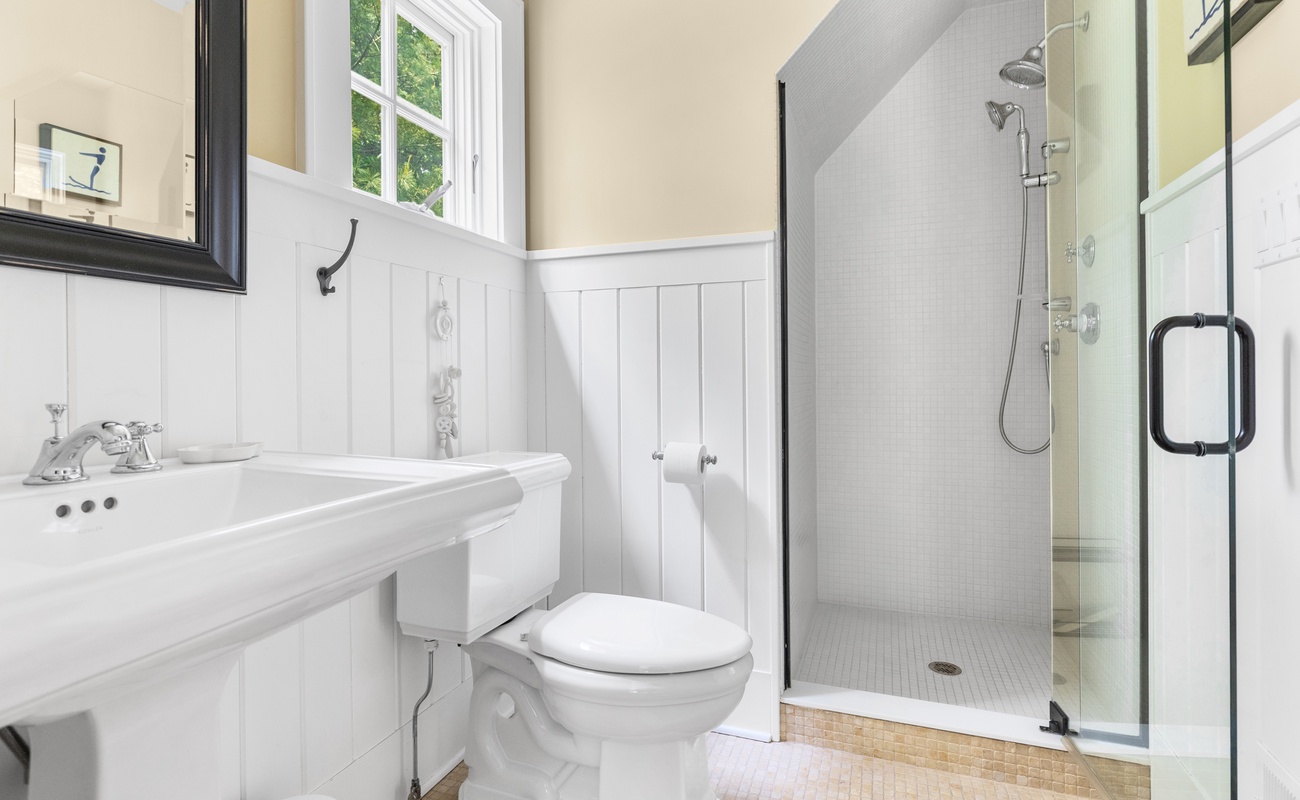 A crisp, modern bath with style in every detail.