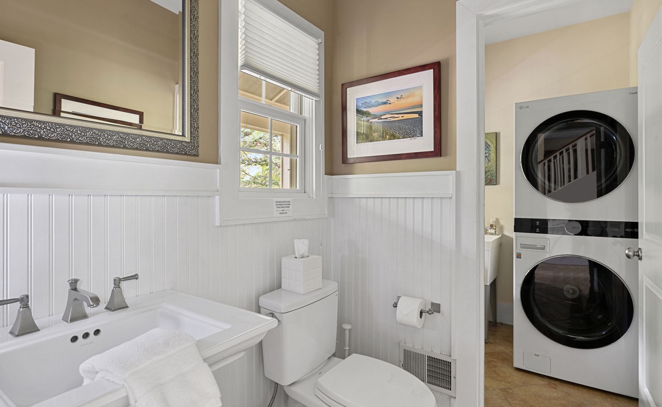 Off of the downstairs bathroom is a laundry room with a high-end washer and dryer.