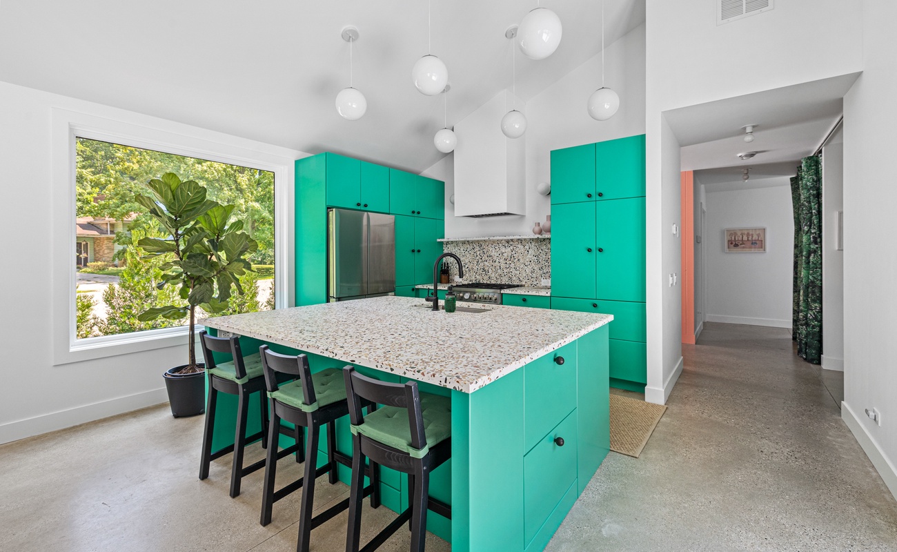 Pull up a stool and enjoy a casual meal or quick snack at the kitchen island.