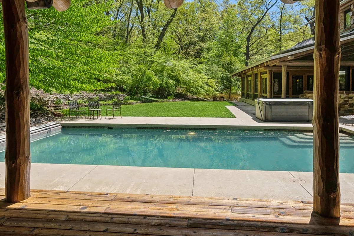 Nature’s backdrop, your personal pool retreat.