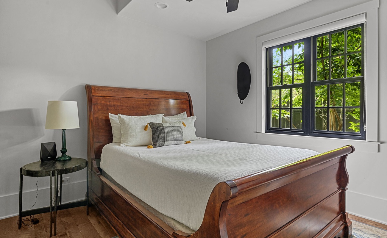 Bedroom 3 is in the main level & has a queen-size bed.