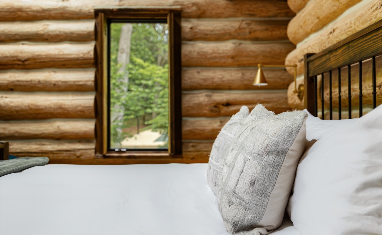 Indulge in the ultimate luxury of nature with this charming log cabin.