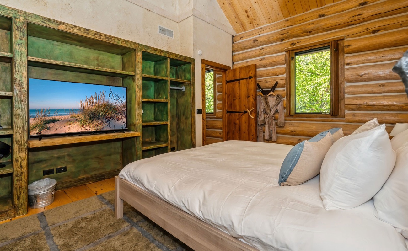 Nestled in timber walls, this room offers rest, comfort, and calming vibes.