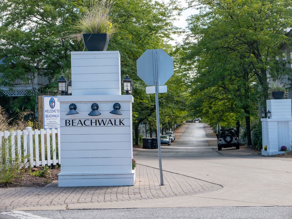 Enjoy Beachwalk Resort’s pools, courts, and private lake beach.