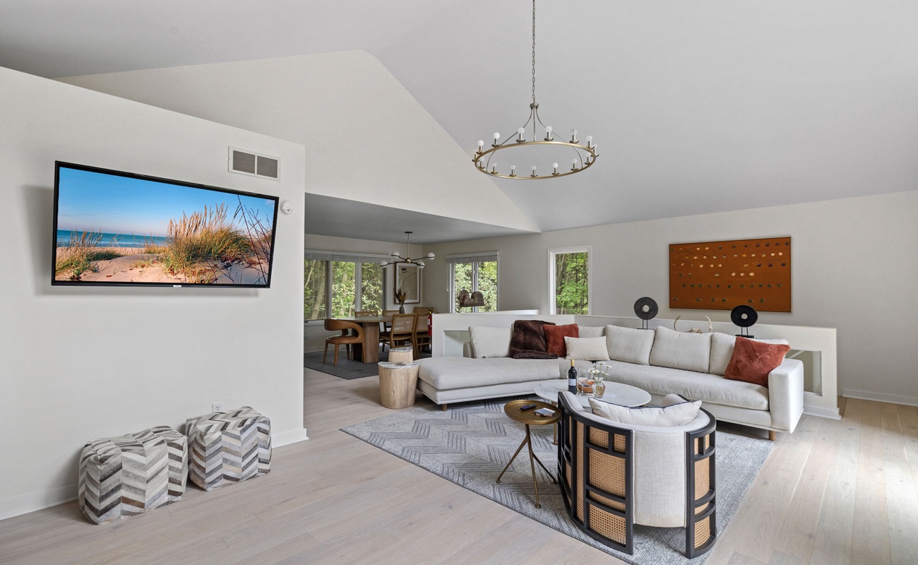 Our living room greets w/ an inviting atmosphere and warm décor.