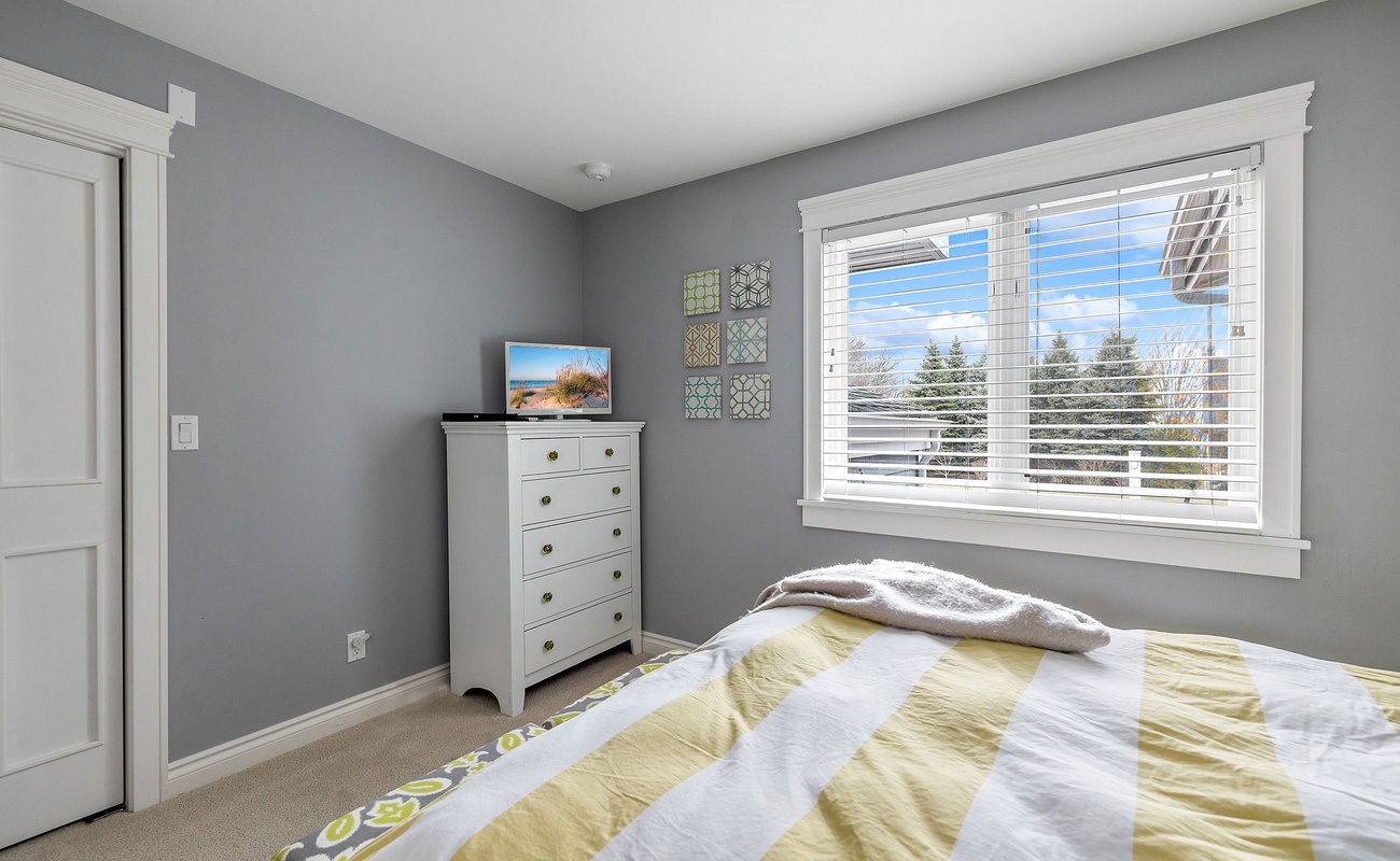 Bedroom 5 is on the lower level & has a queen-size bed.