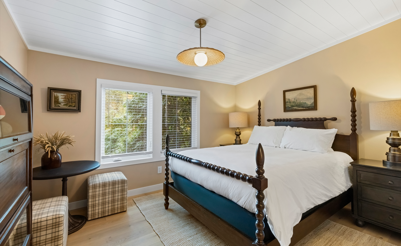 Bedroom 2 has a queen-size bed.