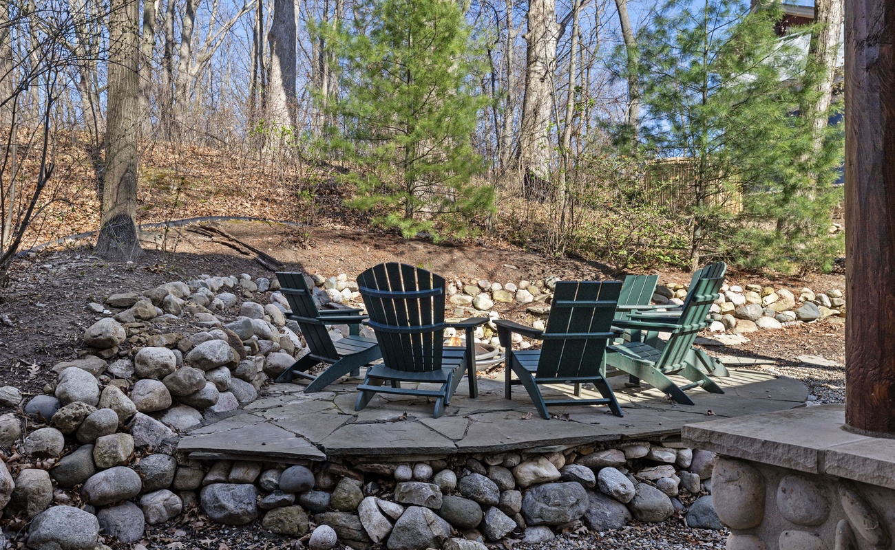 Extend the entertaining outdoors to the stone-surround firepit.
