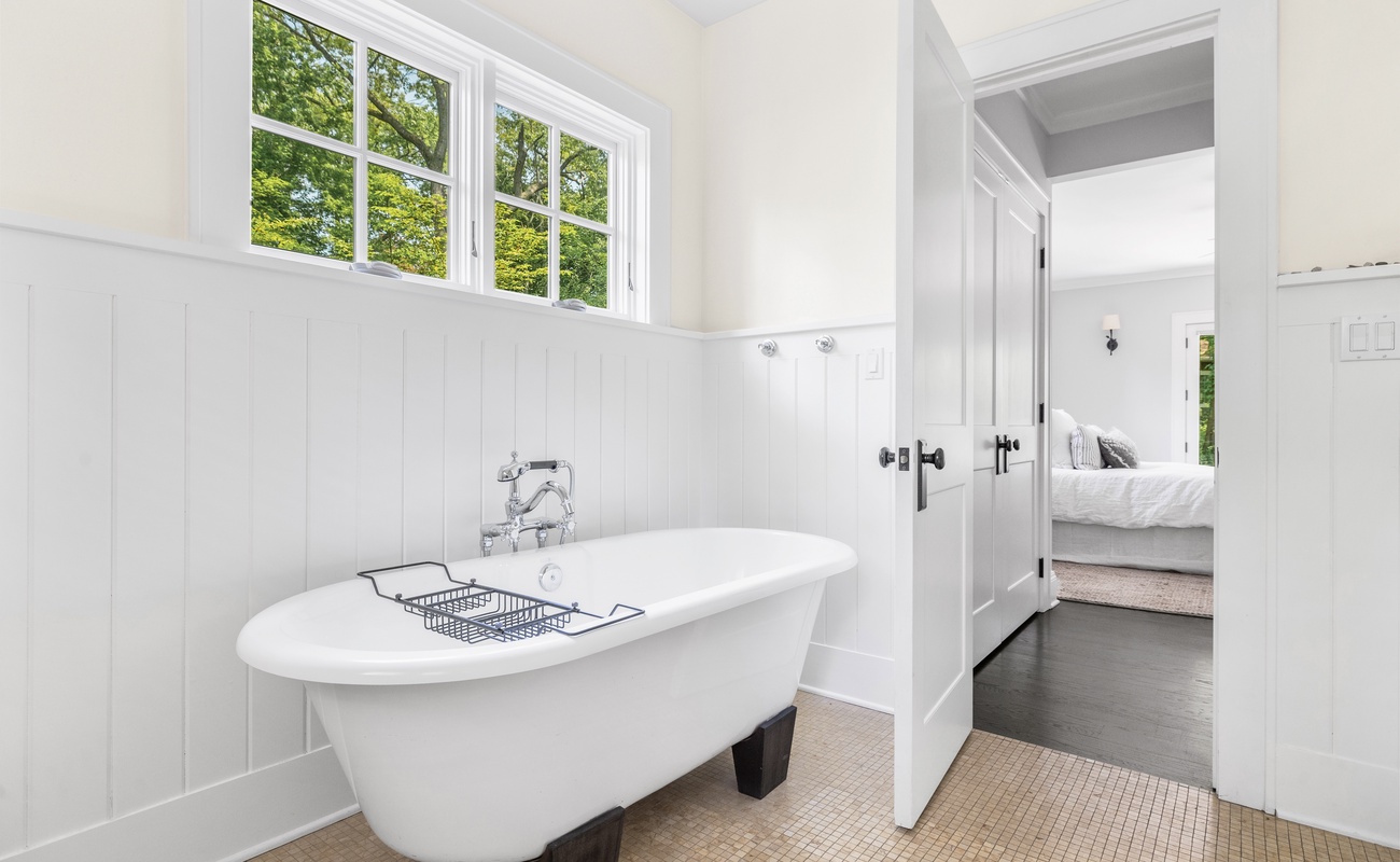 Light-filled, claw-footed, and ready for deep relaxation.