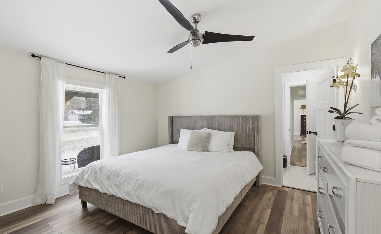 Bedroom 2 has a queen-sized bed.