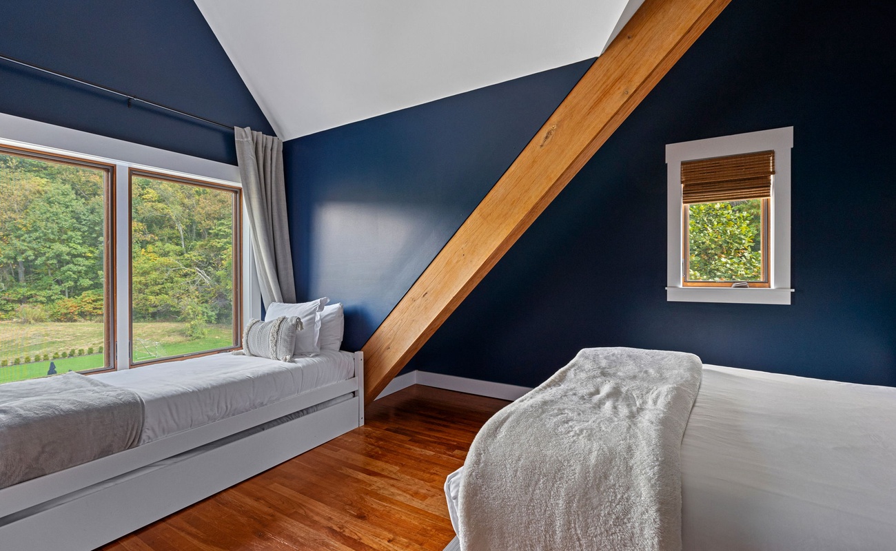 Bedroom 5 is on the upper level & has queen-size bed and 2 twin-size beds.