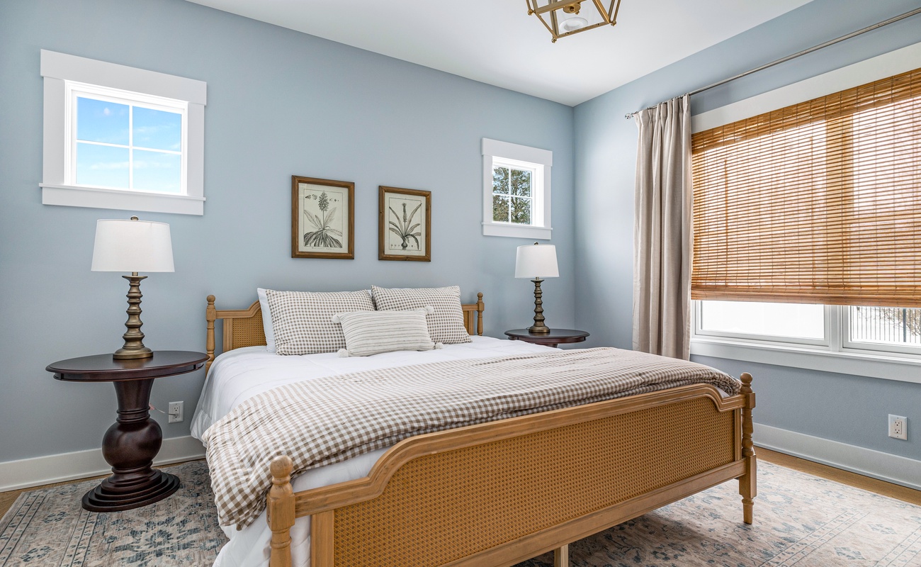 The Primary Bedroom is on the main level & has a king-size bed.