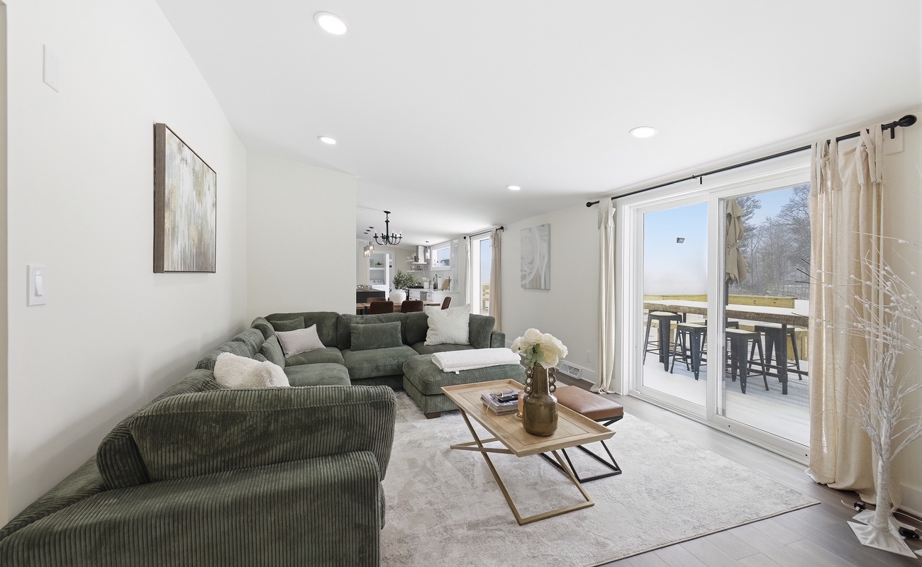 Large sliding doors blend indoor comfort with easy access to the deck.