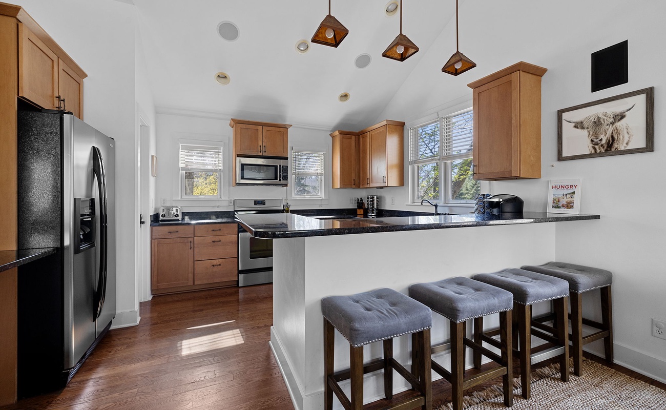 Wild Horse Run’s spacious, eat-in kitchen with high-end appliances is every chef’s dream.