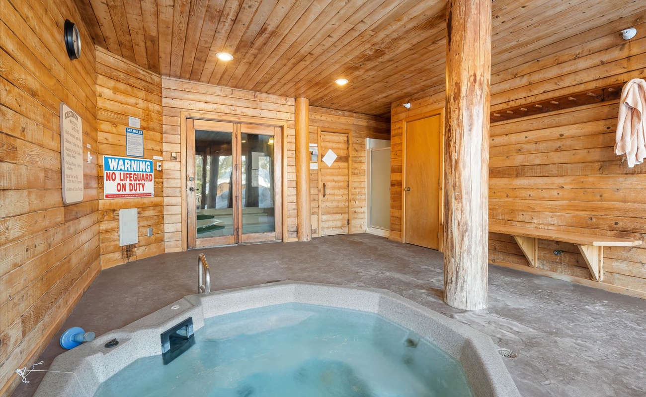 A warm and inviting hot tub, perfect for soaking up the mountain views.
