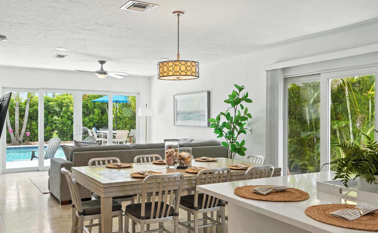 Bright open space with pool views and tropical vibes.
