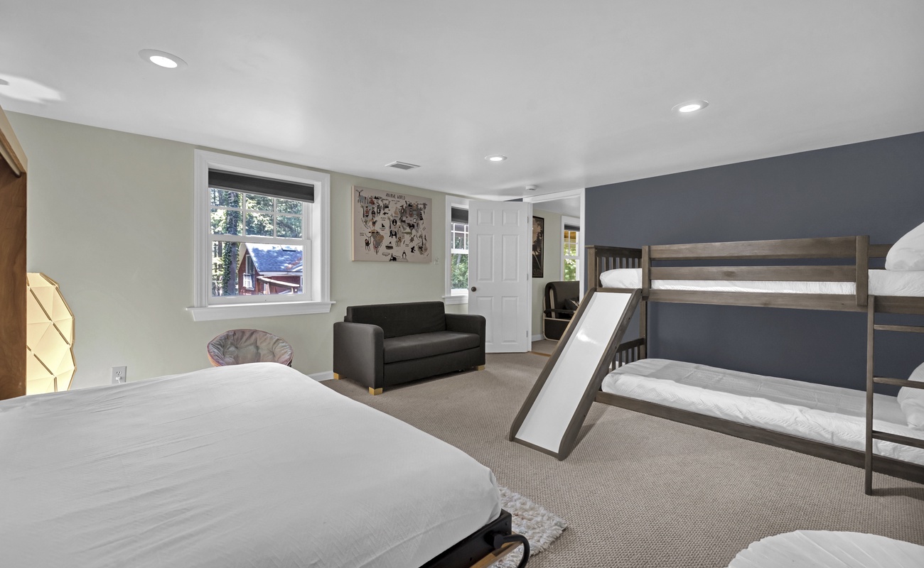 The ultimate kids’ zone—slide, bunks, and room to play.