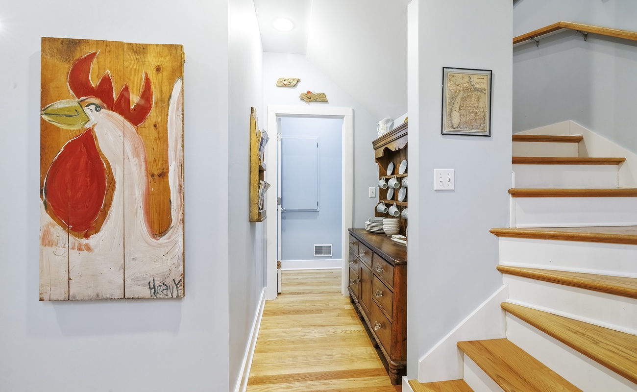 Easy flow between levels with artful Harbor Country touches.