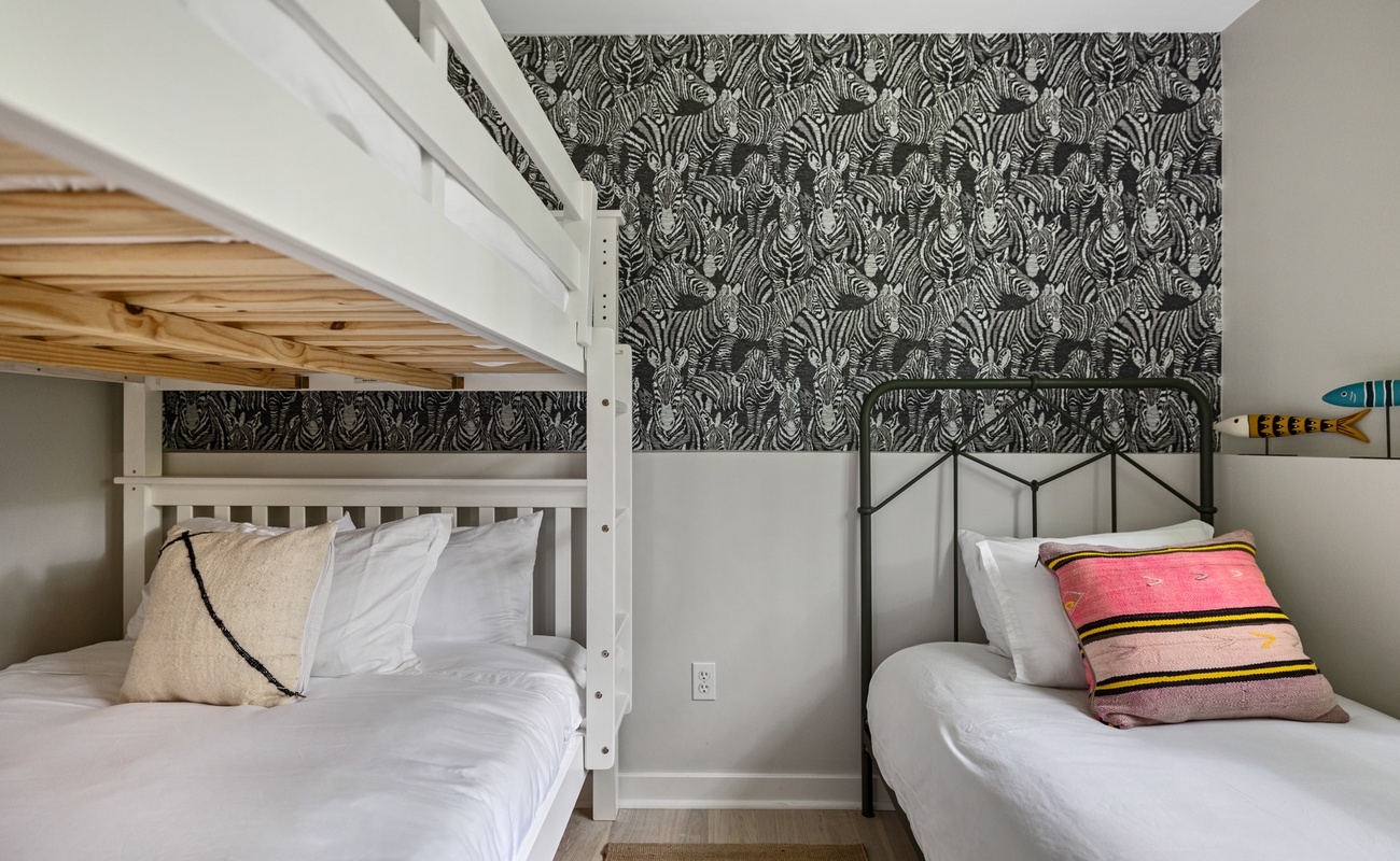 Bedroom 3 is on the lower level & has twin and full-size bunkbed.