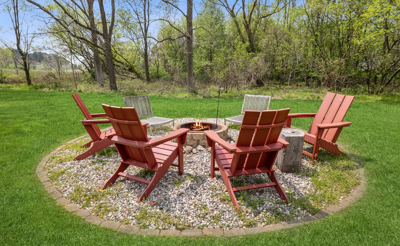 Gather around the crackling flames at the outdoor firepit.