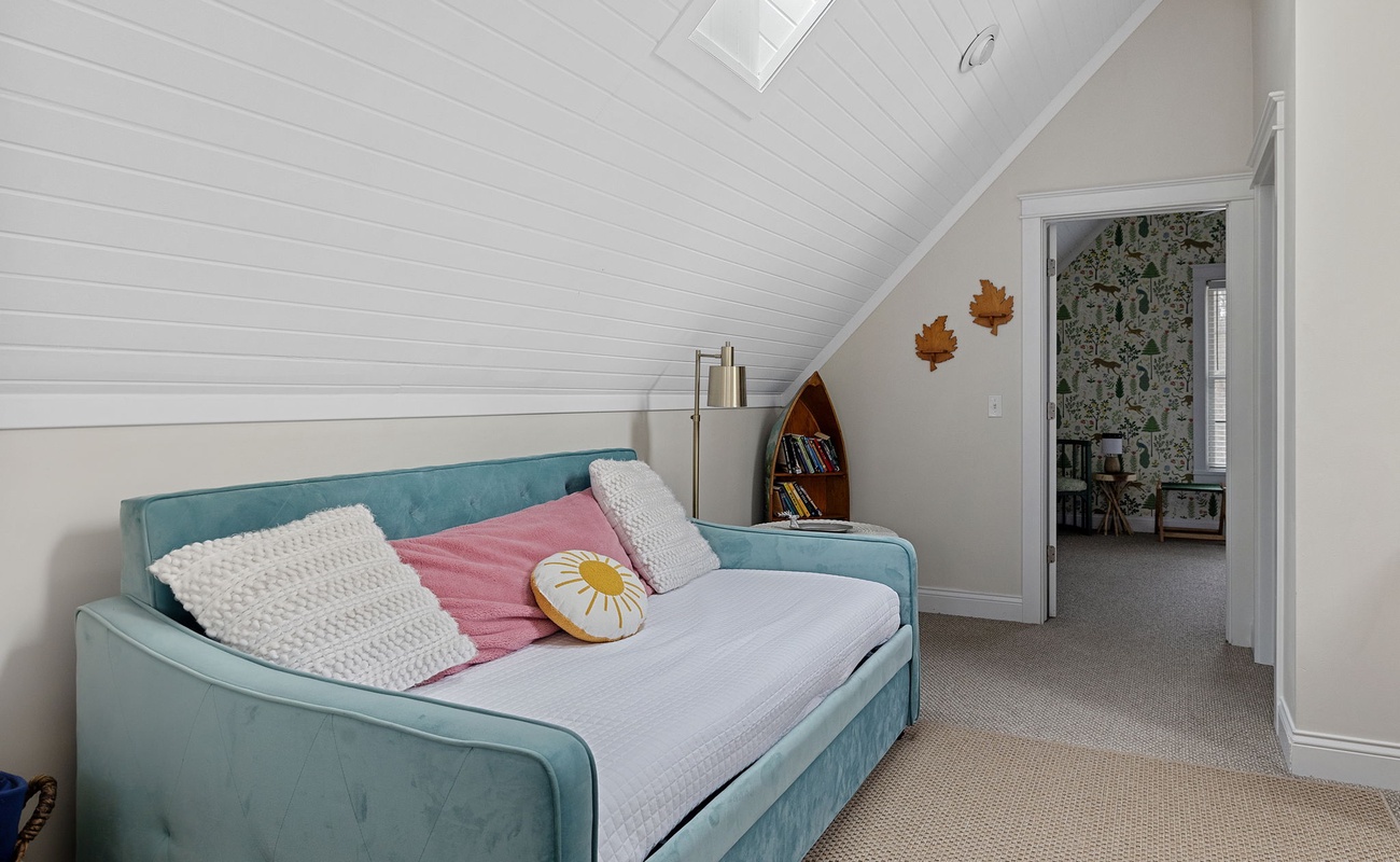 The upstairs family room couch is a primo spot for chillin' out with a beverage.