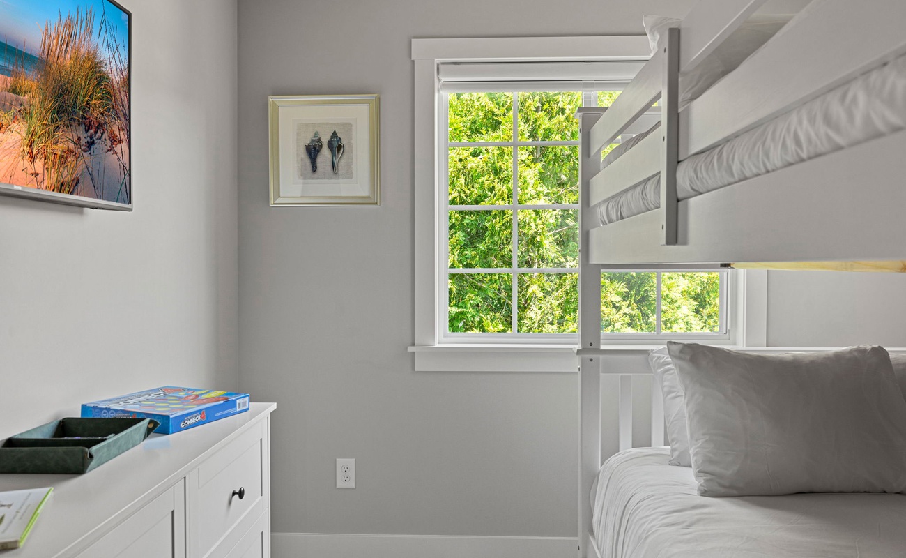 Step into a world of sunshine, cozy bunk beds, and endless board game fun—your perfect playtime haven!