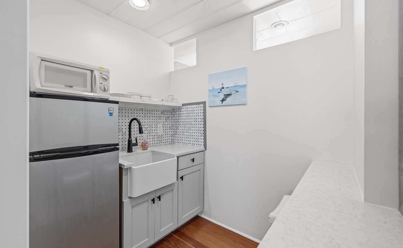 A handy kitchenette for quick snacks and cold drinks.