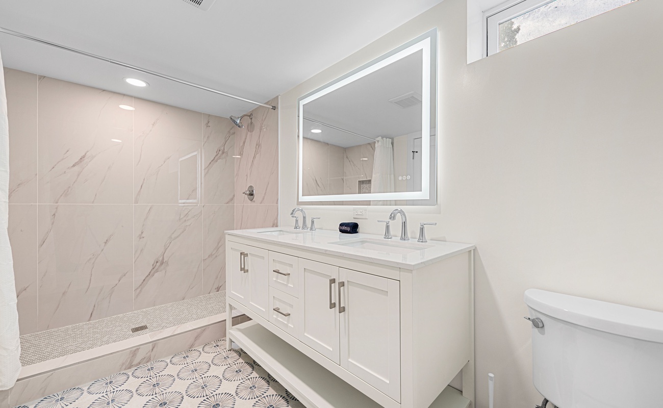 Spa-inspired bath with walk-in shower & double vanity.