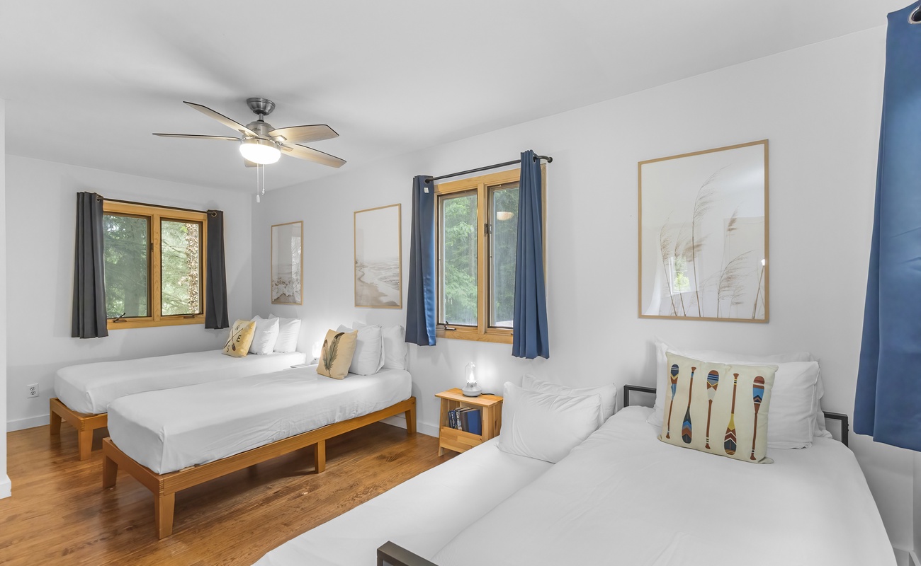 Bedroom 3 is on the upper level & has 3 twin beds and a trundle bed.