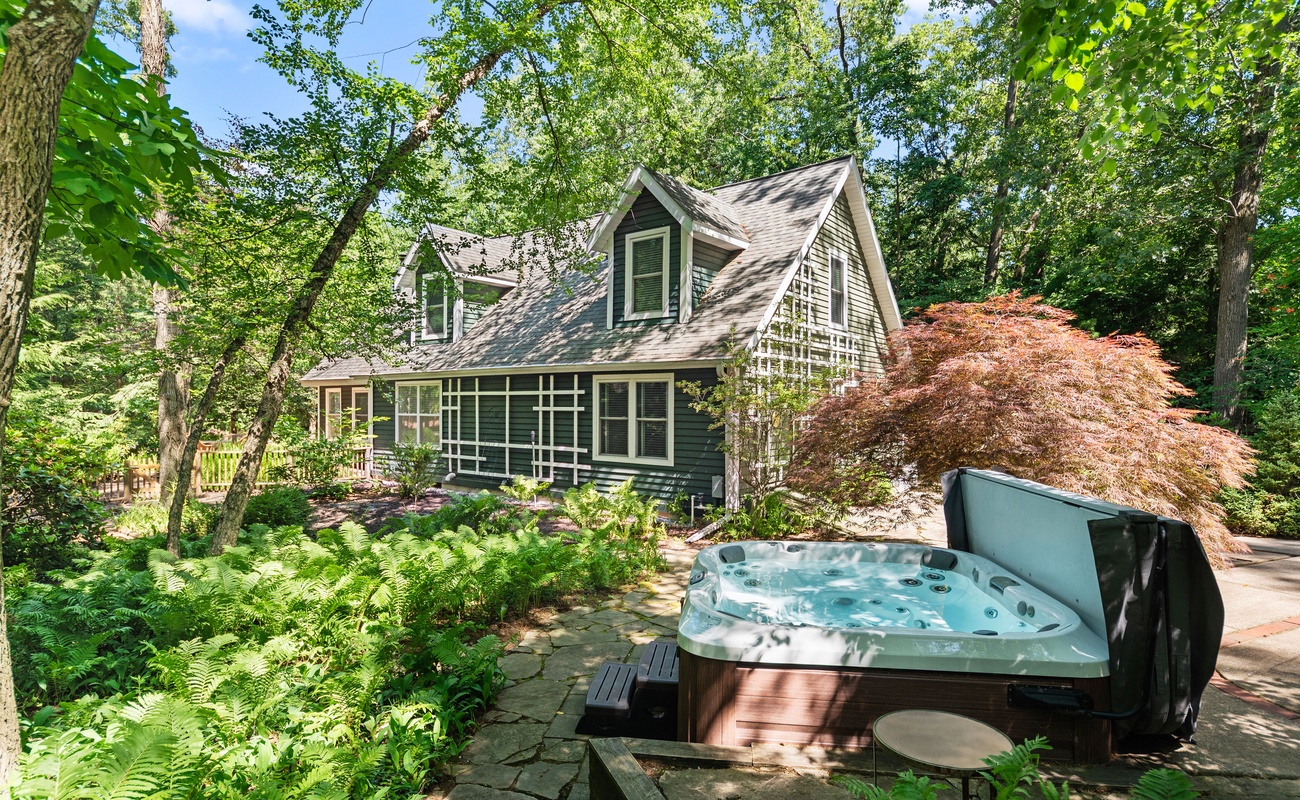 Soak under the trees in your private woodland spa.