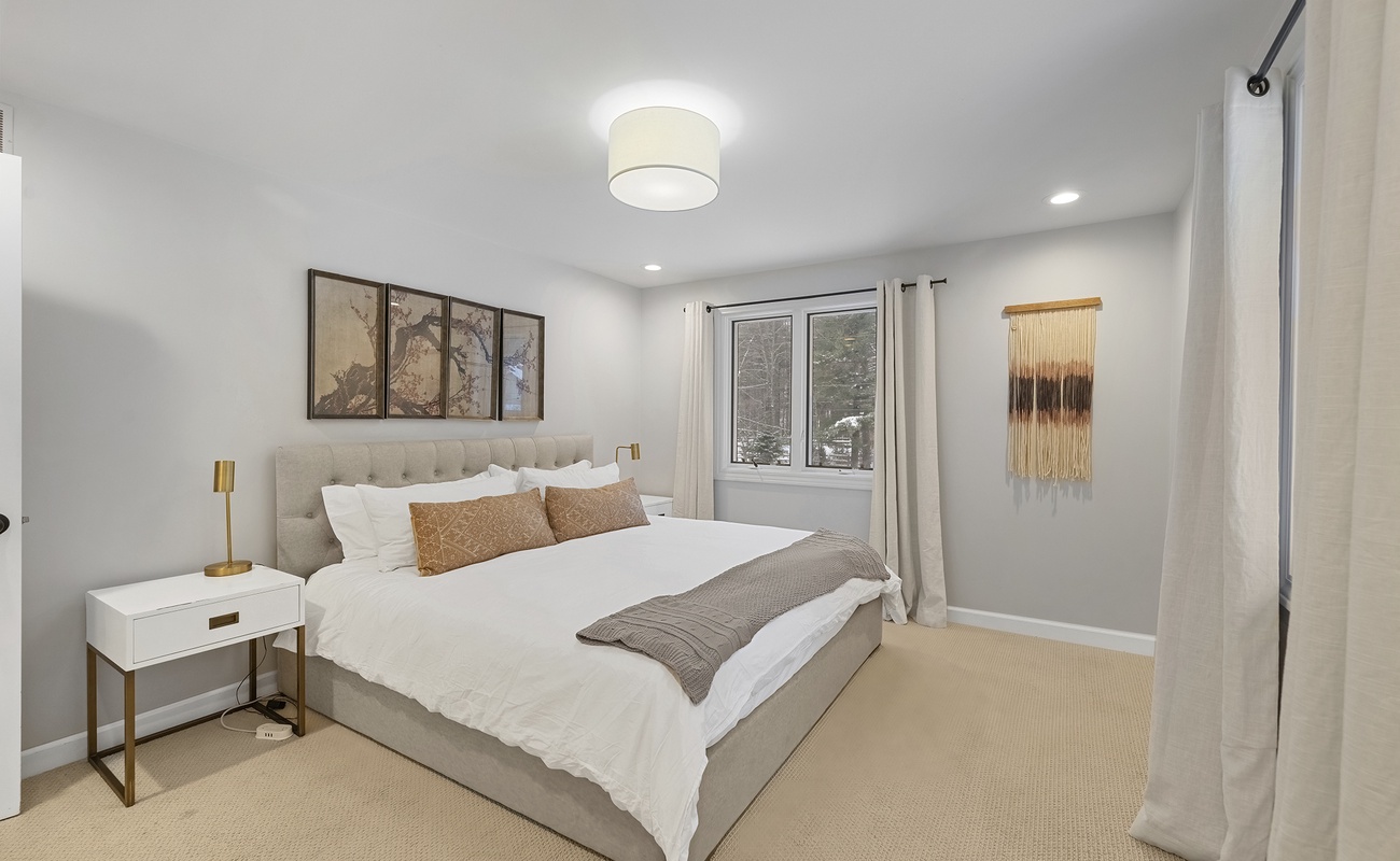 Bedroom 2 is on the upper level and has a king-size bed.