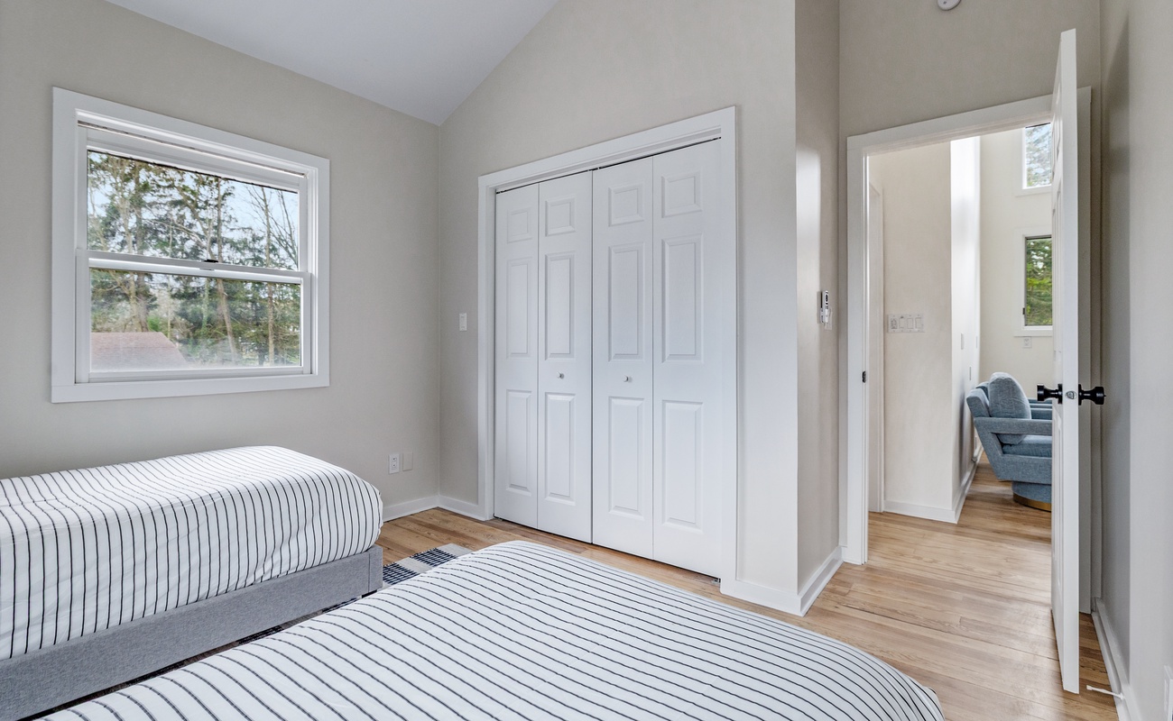 This fresh and airy twin room is perfect for sharing. Light-filled, comfy, and just steps from the chill loft lounge.
